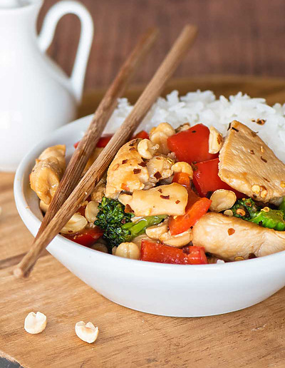 Kung-Pao-Chicken-Panda Express Copycat Recipe in bowl with chopsticks
