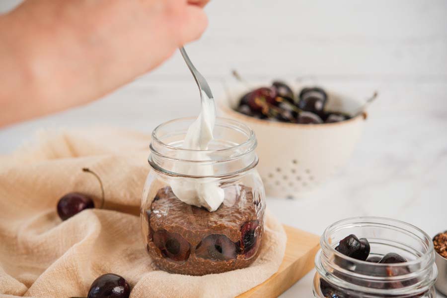 monk fruit sweetener being poured into a mason jar