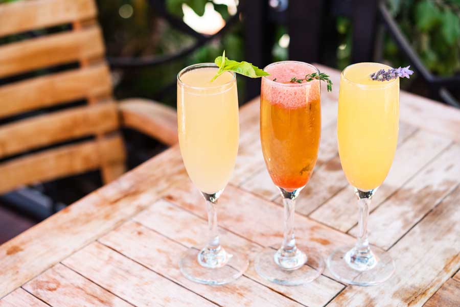 three mimosas on a table from sapphire laguna beach brunch