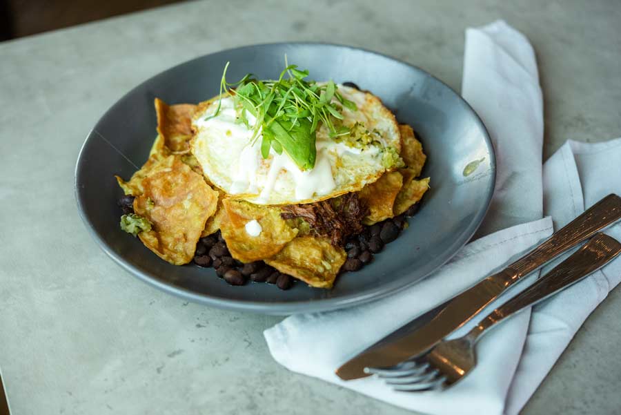 short rib chilaquiles in a bowl