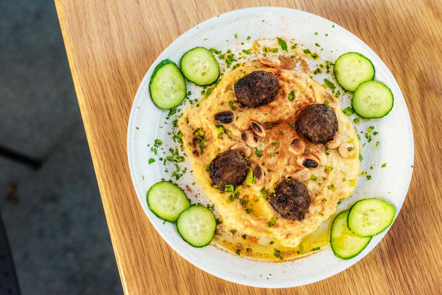 Outpost-Kitchen-Hummus topped with small meatballs