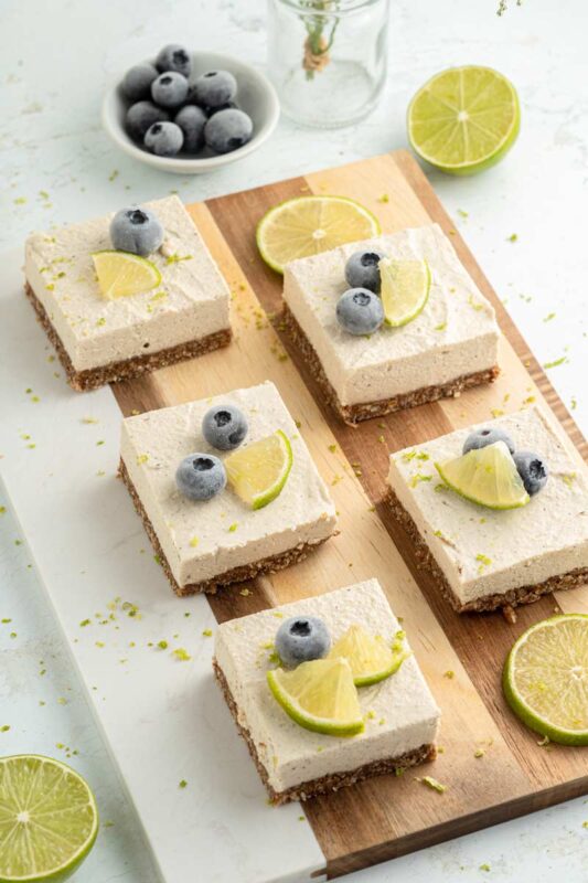 vegan-gluten-free-key-lime-pie slices on a cutting board