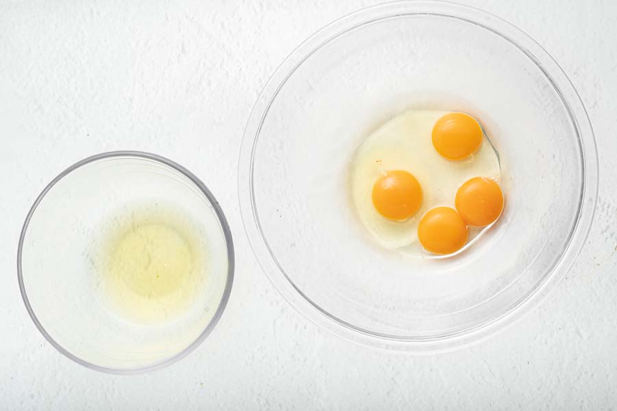 eggs and egg whites in two bowls