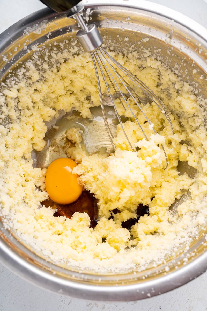 adding-egg-to-cupcake-batter