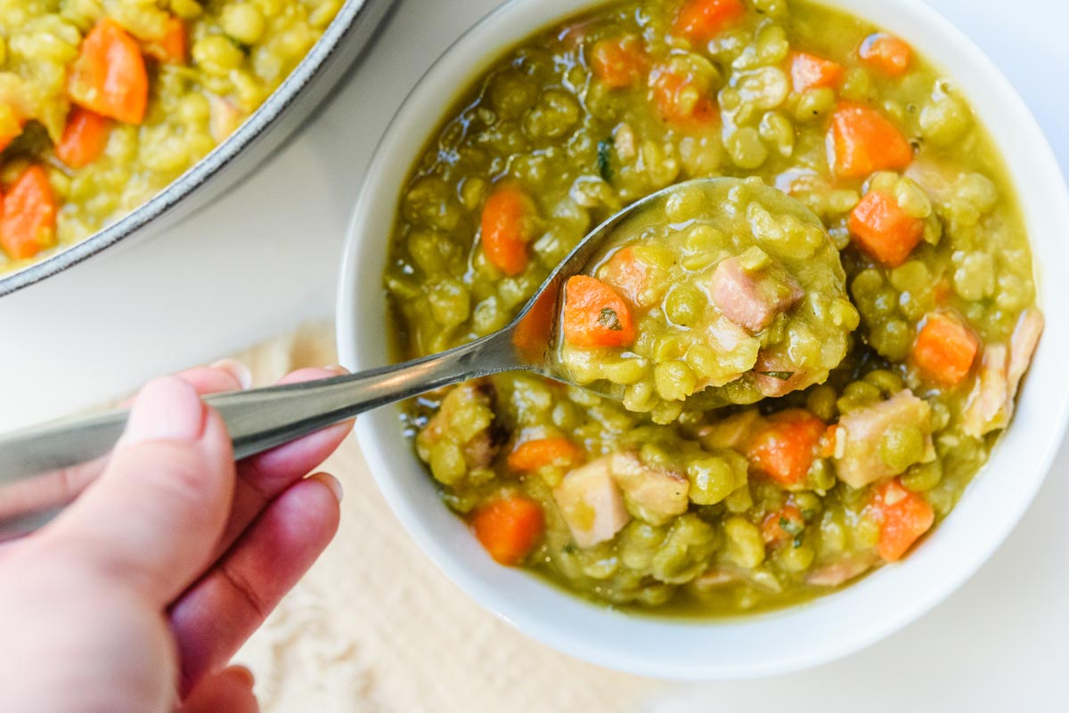 Split-Pea-Soup-on-spoon-in a bowl