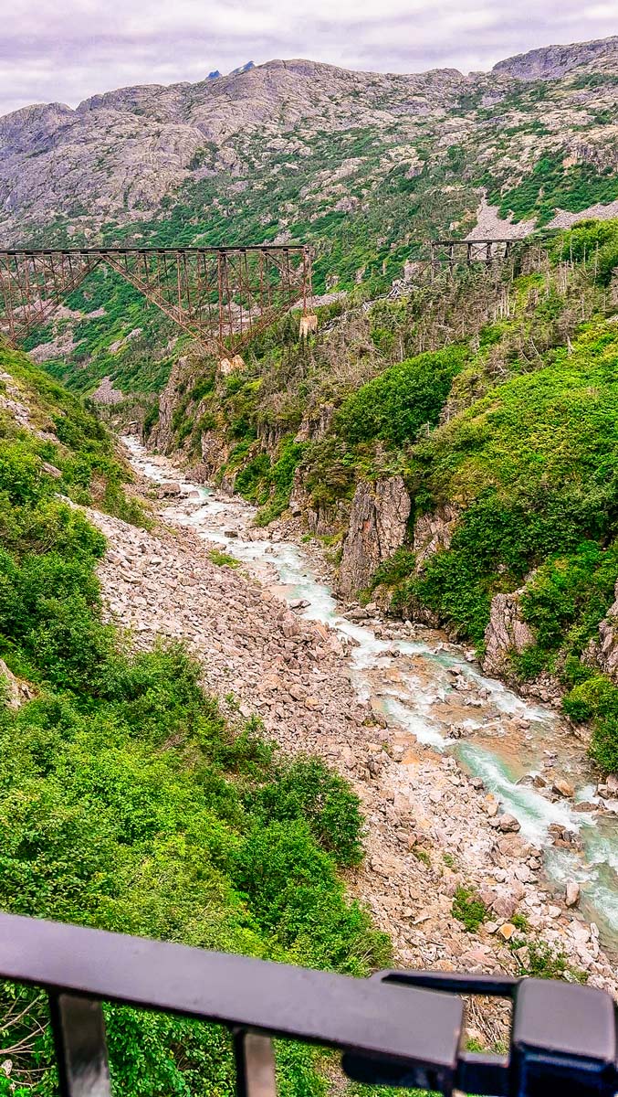 White Pass Railroad & Yukon Suspension Bridge: A Must-Do Excursion in Skagway, Alaska 8 View-of-River-and-Broken-Bridge-from-White-Pass-Railroad